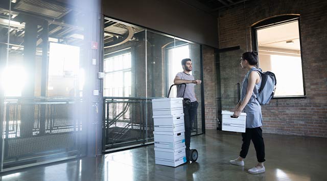 A woman using pods employee relocation services